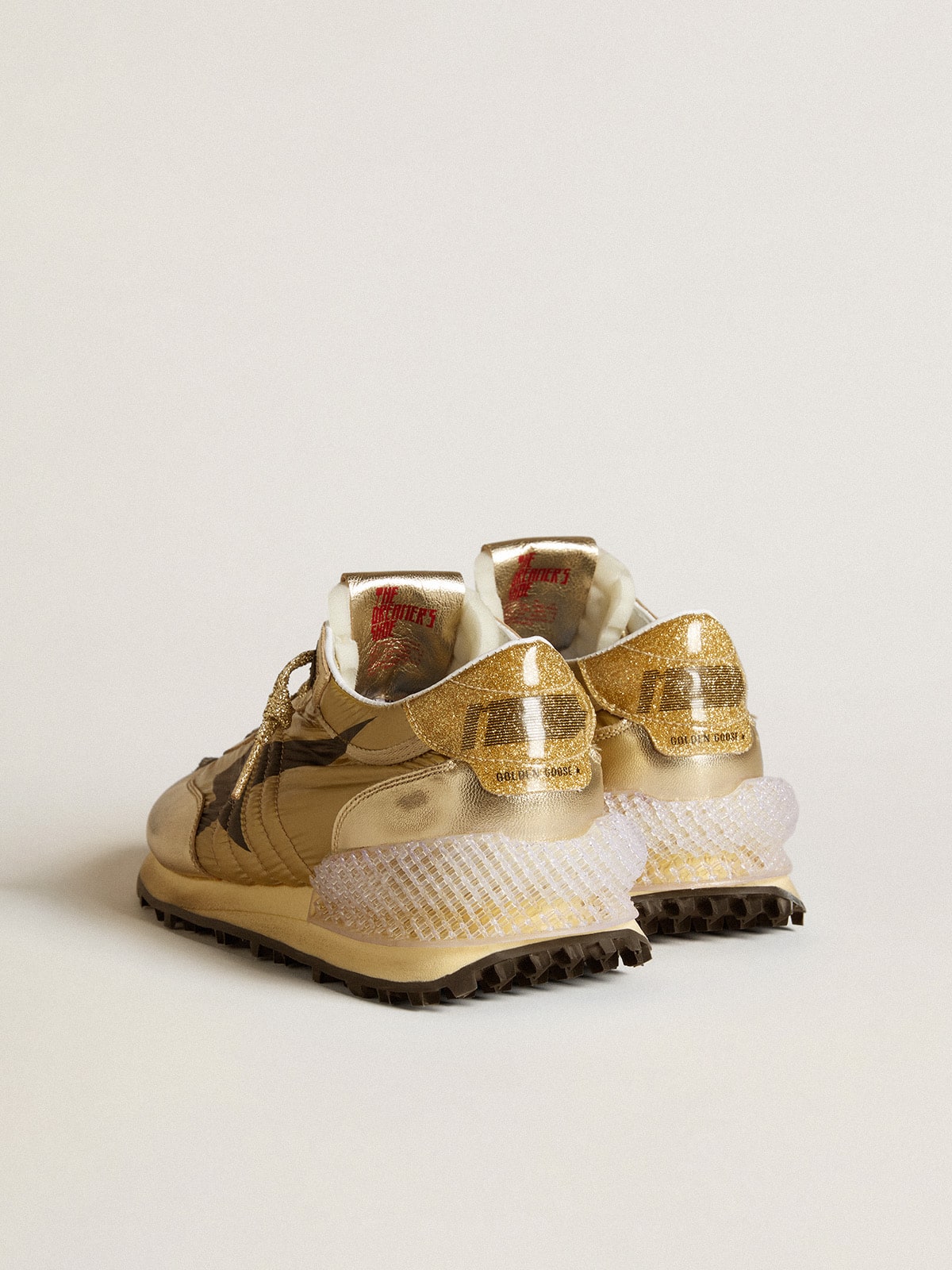 Golden Goose - Gold Marathon Uomo con tomaia in nylon di colore oro in 