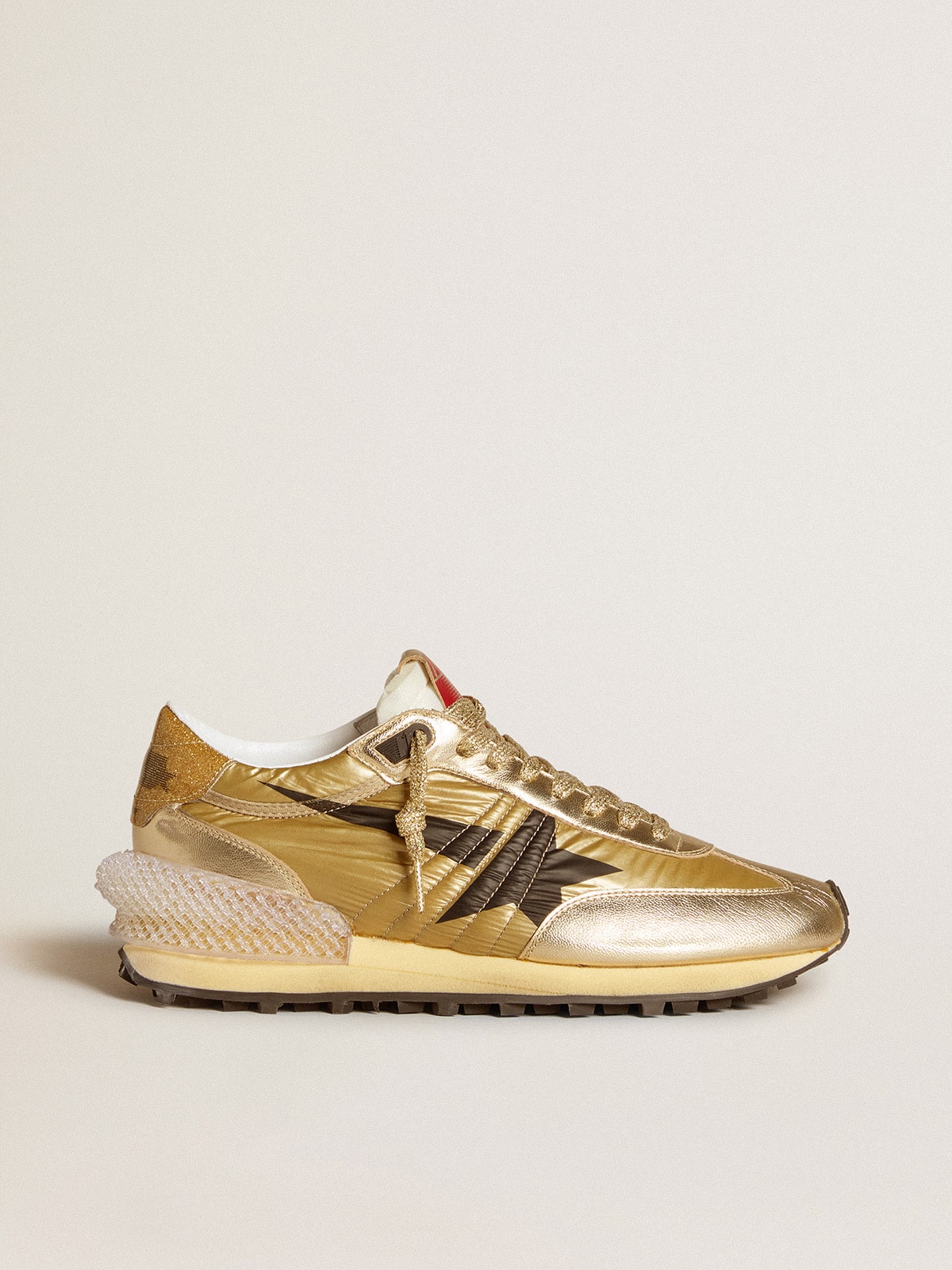 Golden Goose - Gold Marathon Uomo con tomaia in nylon di colore oro in 