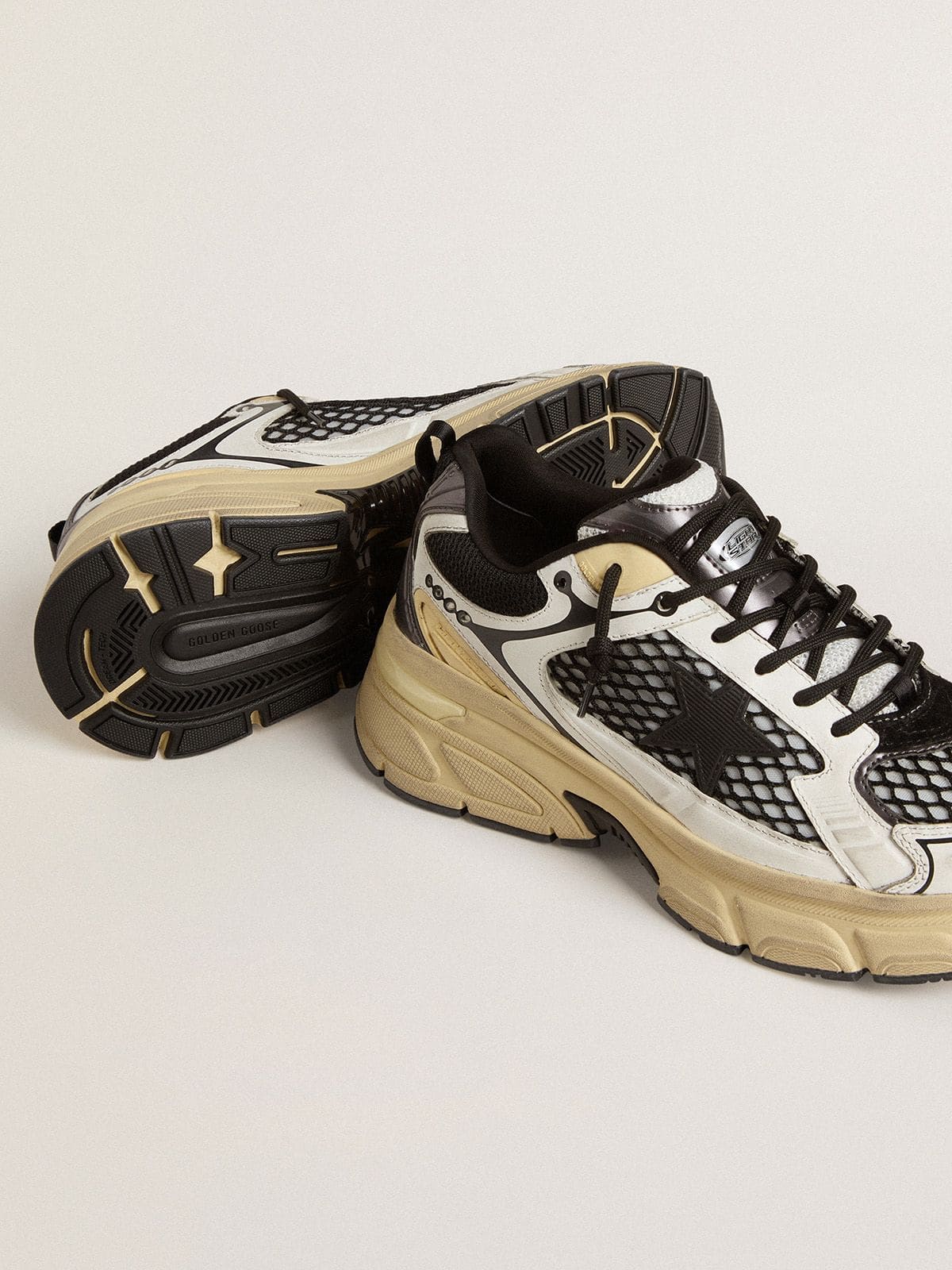 Golden Goose - Men’s Lightstar in white leather and black mesh with black TPU star in 