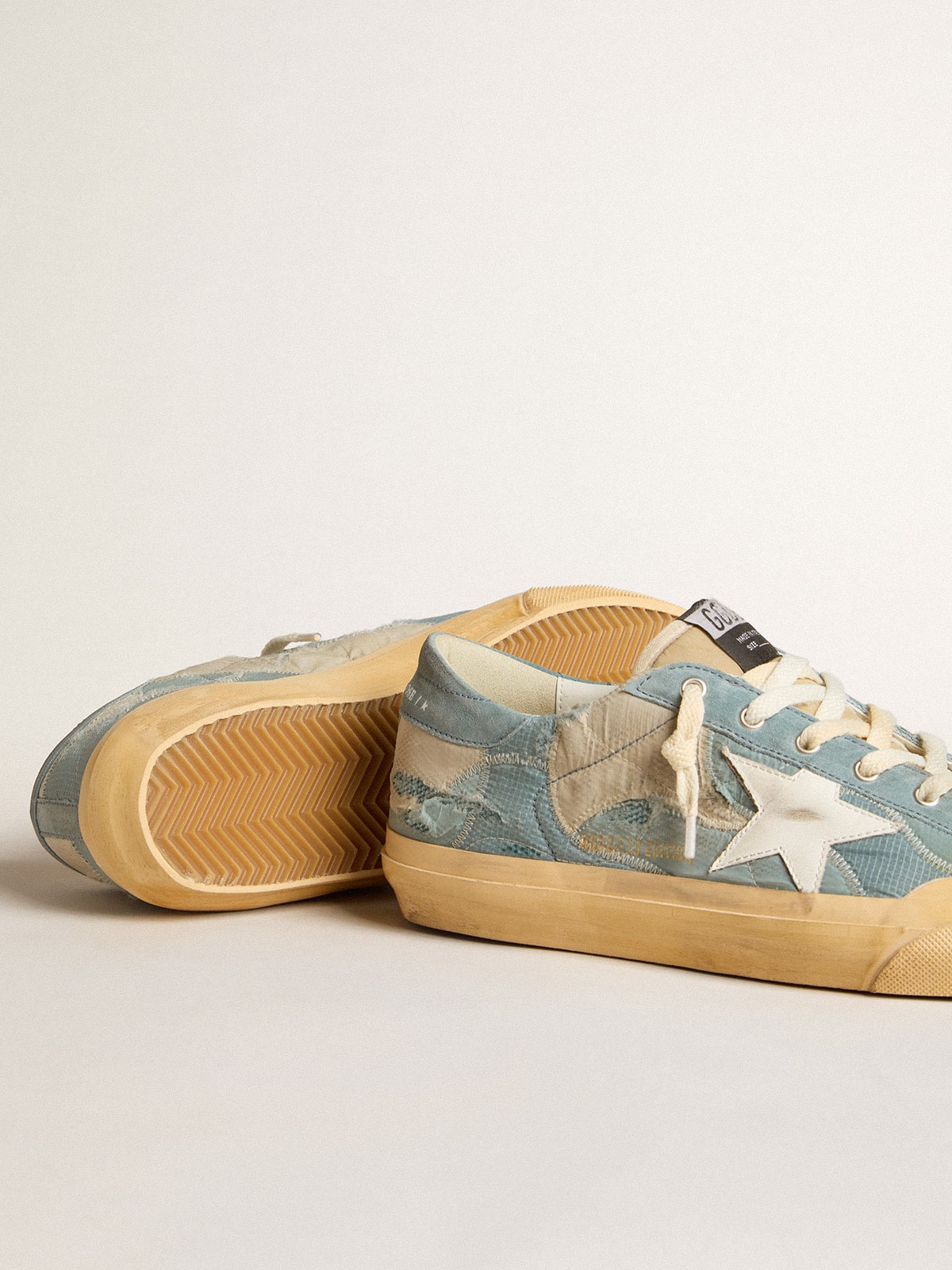 Golden Goose - Super-Star de tela e náilon azuis com estrela de couro branco in 