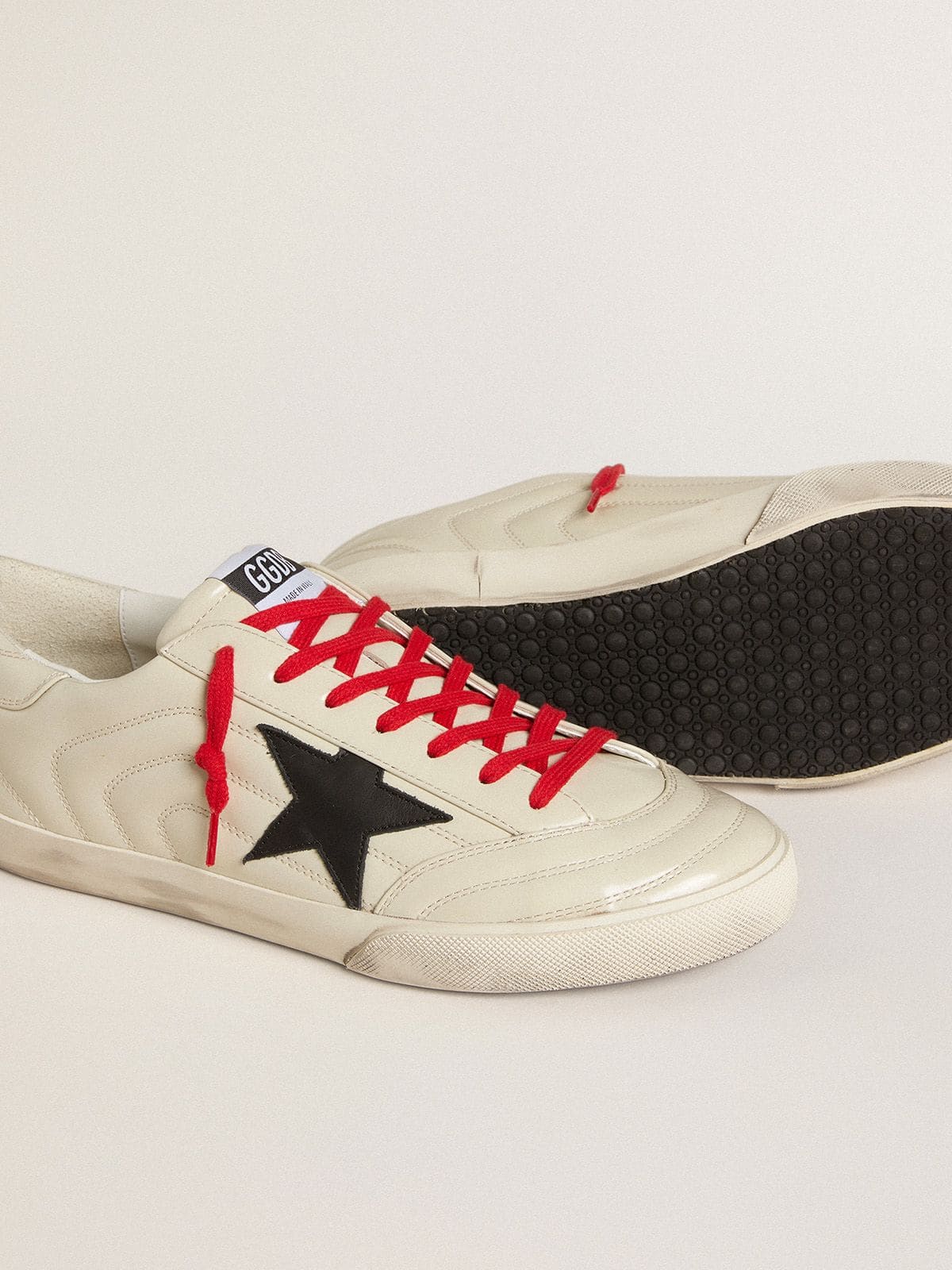 Golden Goose - Men's Super-Star in glossy white matelassé leather with black leather star in 
