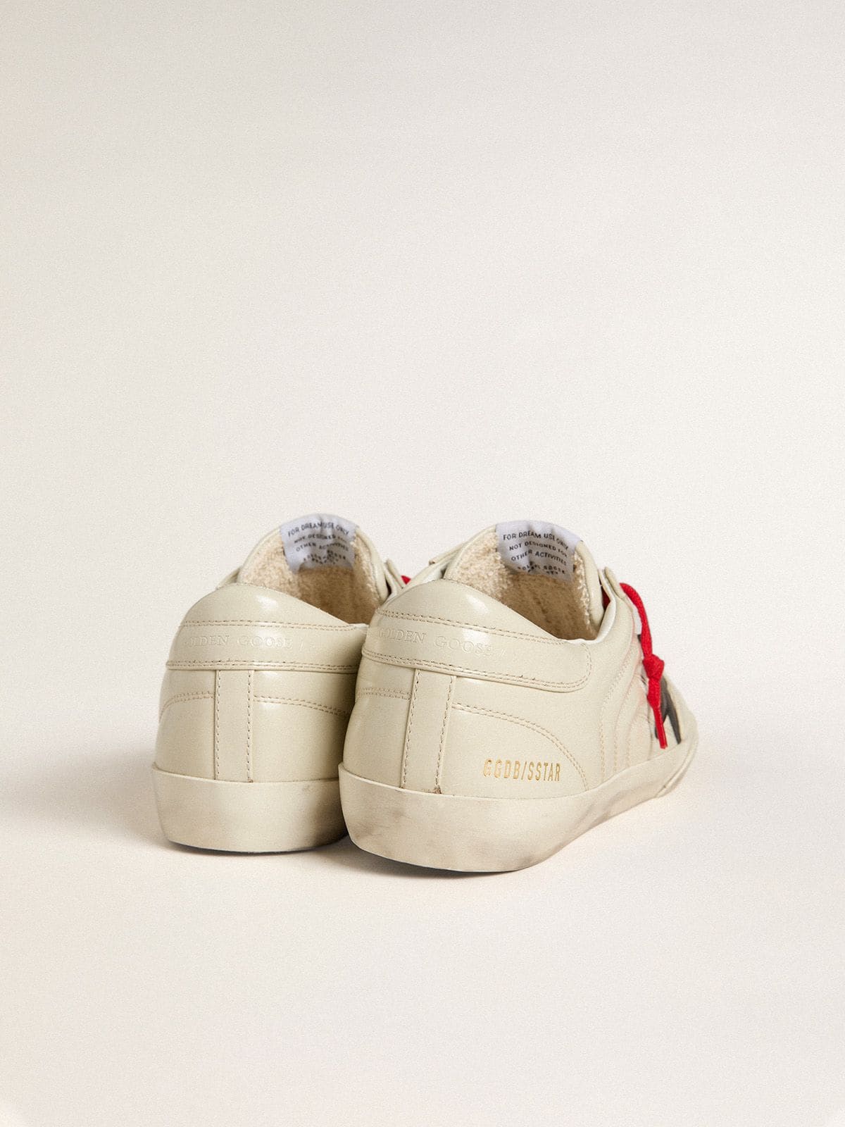Golden Goose - Men's Super-Star in glossy white matelassé leather with black leather star in 