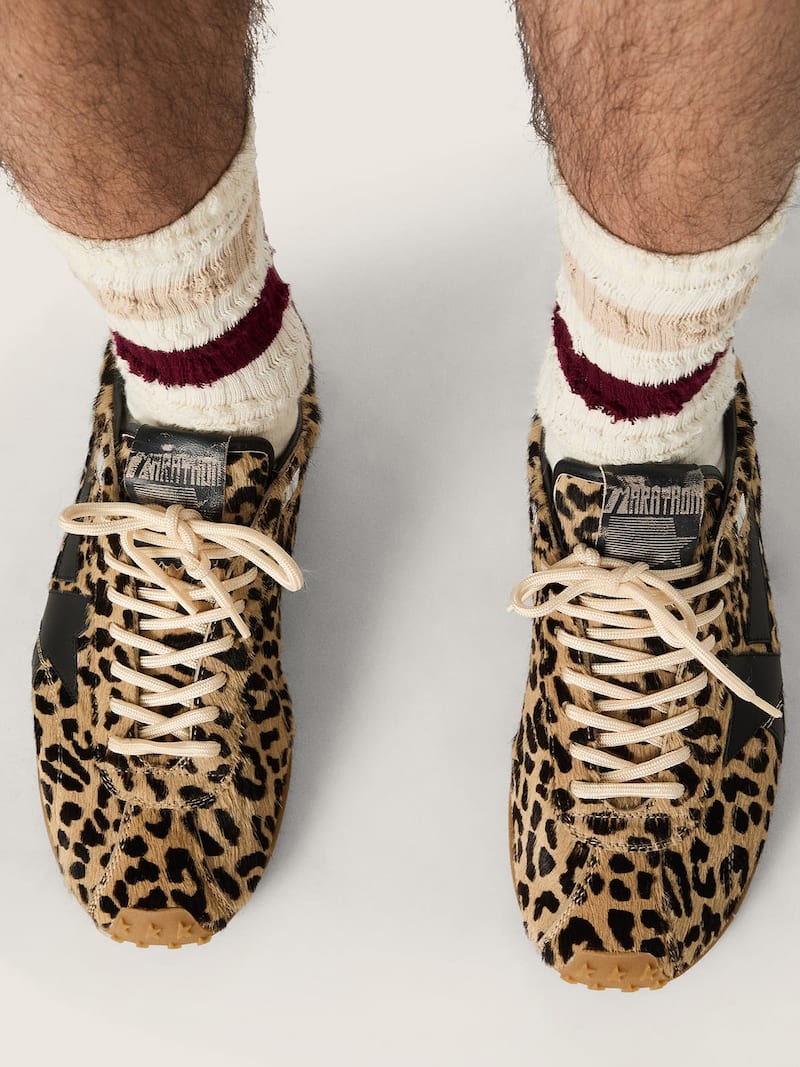 Golden Goose - Marathon Speed de hombre de piel efecto potro con estampado leopardo color beige y negro y estrella de piel negra in 