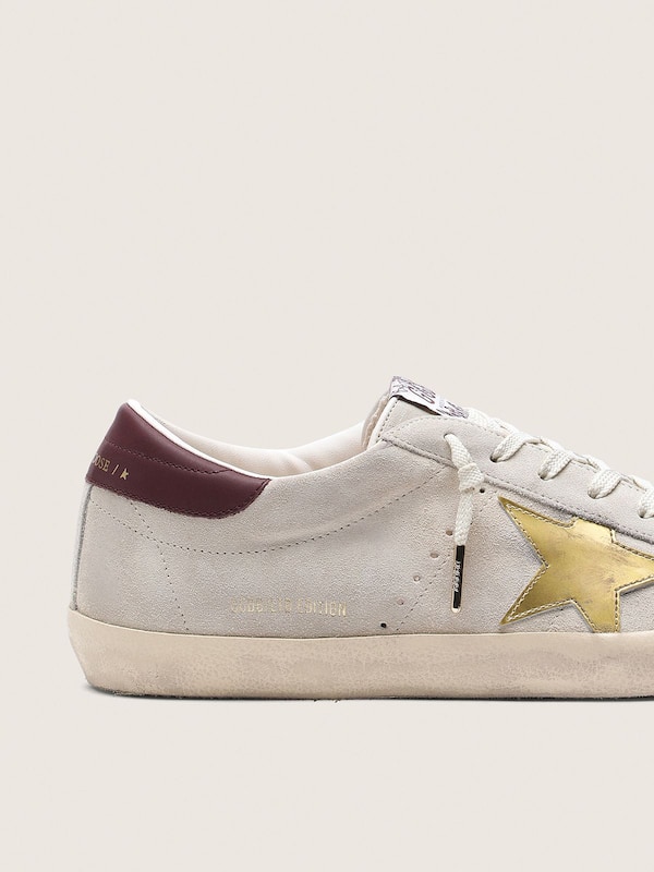 Golden Goose - Men's Super-Star CNY in ivory suede with metallic leather star and leather heel tab in 