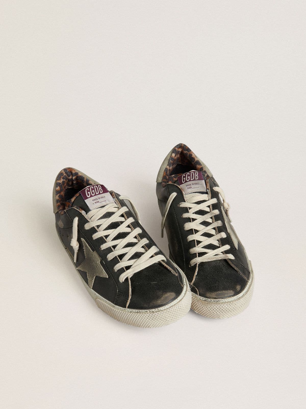 Men's Super-Star in black leather with gray suede star and heel tab