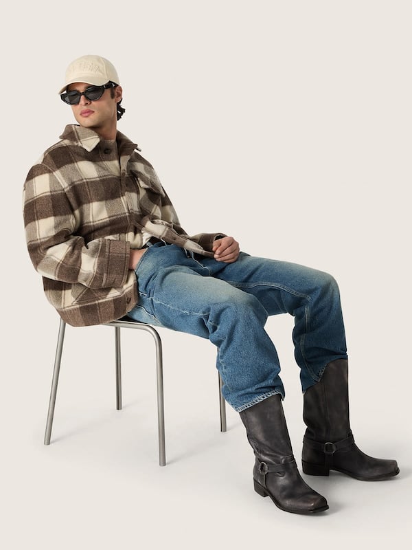 Golden Goose - Men's high Biker boots in black leather with strap and silver-colored buckle in 