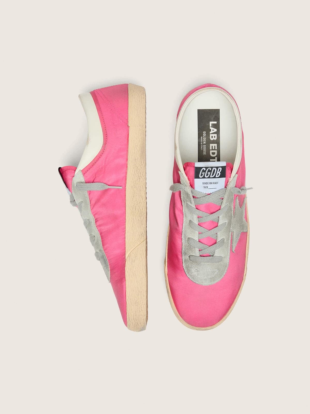 Men&rsquo;s Super-Star in neon pink nylon with light gray suede star