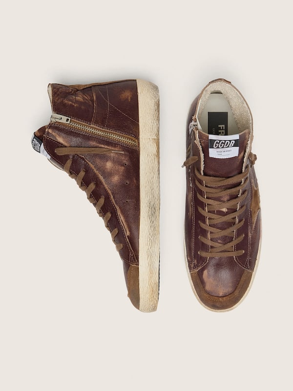 Francy LTD de hombre de piel marr&oacute;n oscuro con estrella beige