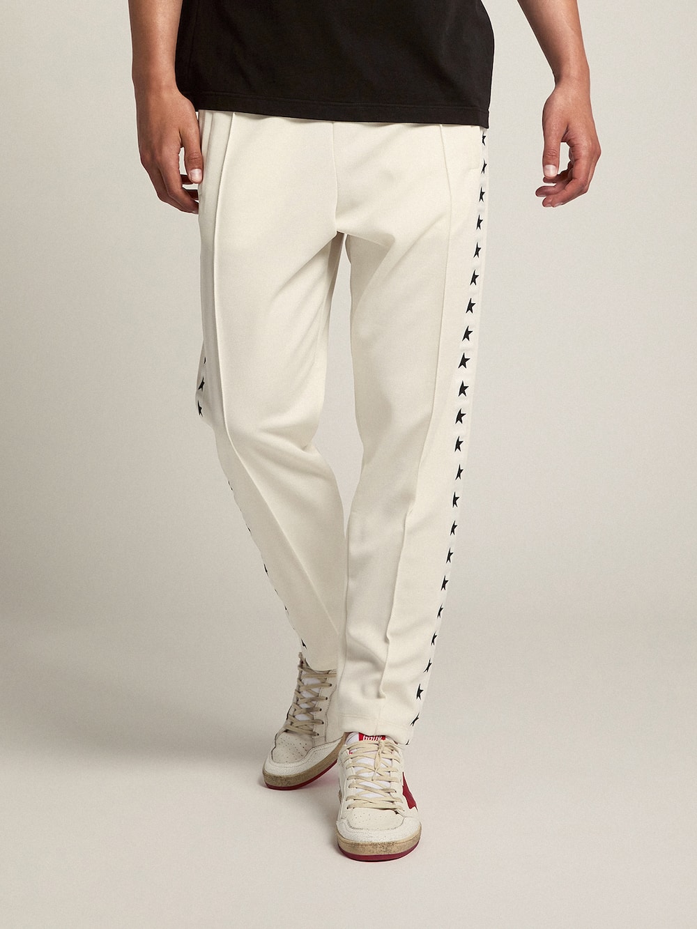 Golden Goose - Pantalon de jogging homme blanc avec étoiles noires sur les côtés in 