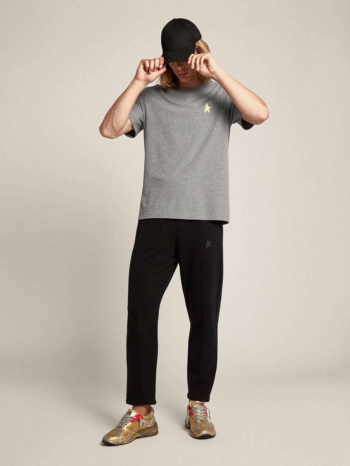 Golden Goose - Pantalone jogging da uomo color nero con stella sul davanti in 