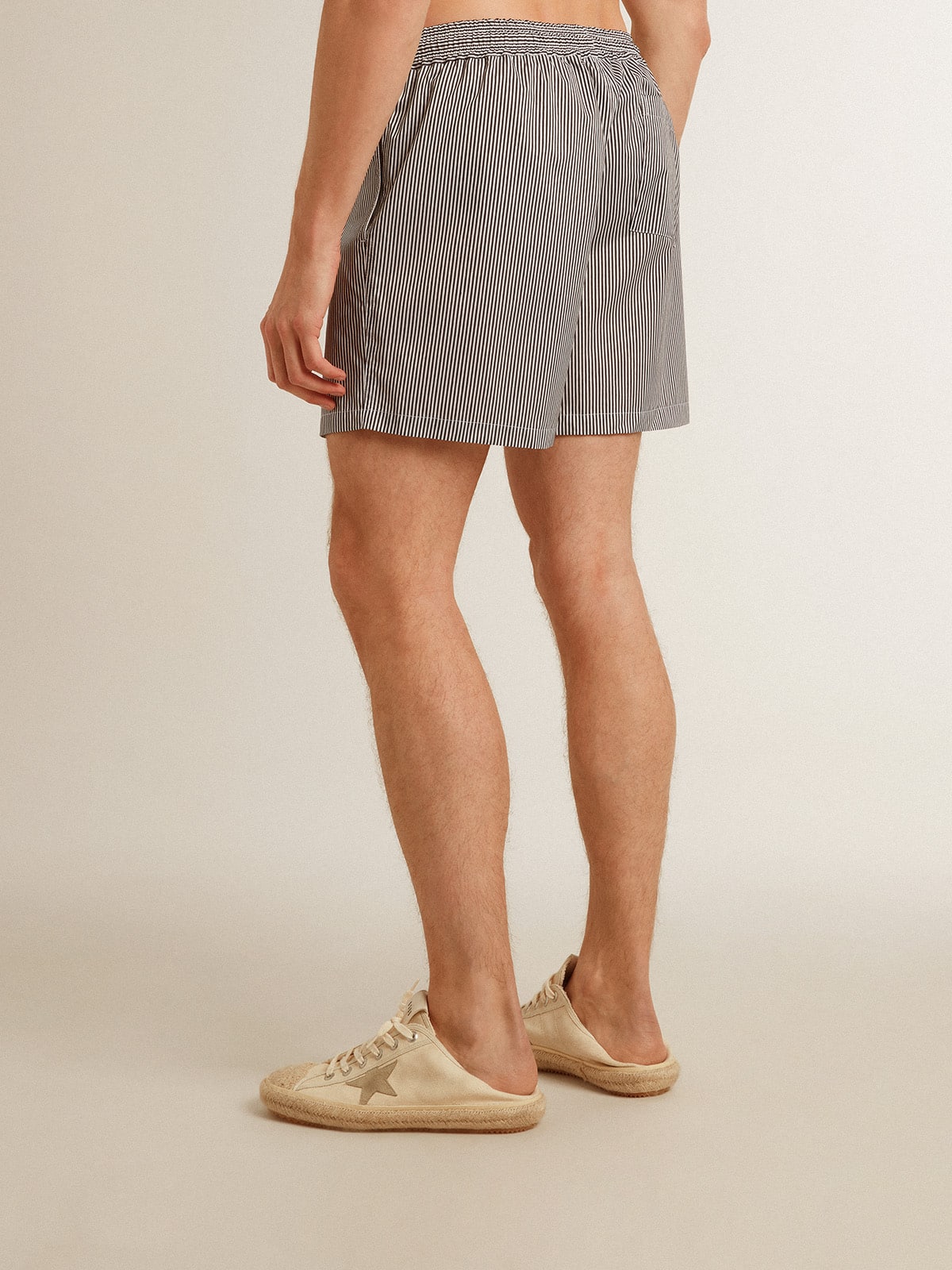 Golden Goose - Swim shorts in blue and white striped technical fabric in 