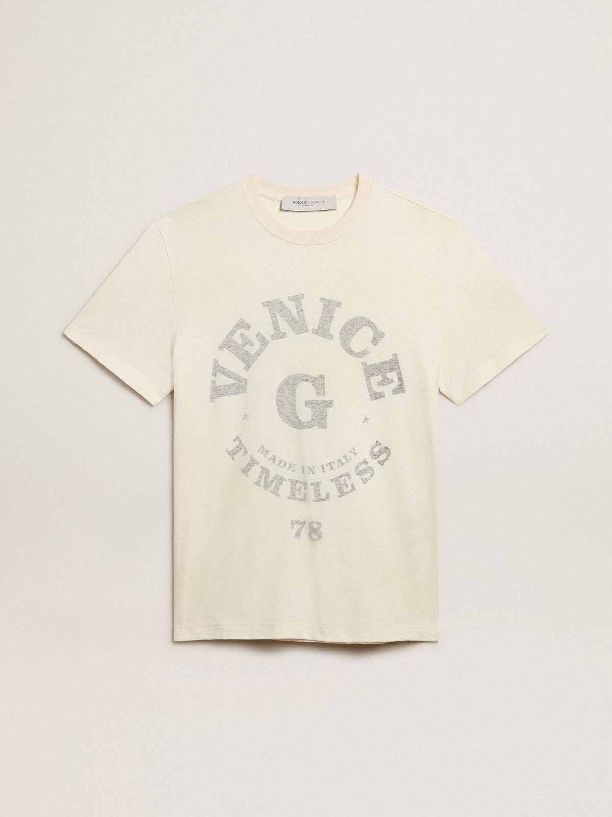 Men's cotton T-shirt in aged white with faded lettering | Golden Goose