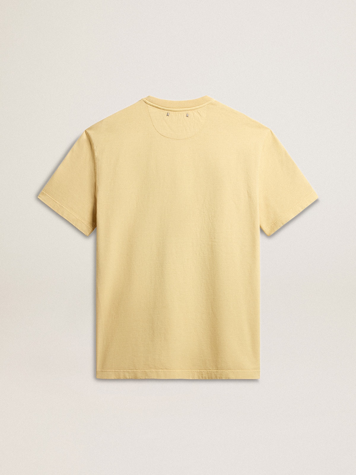 Men s cotton T shirt in pale yellow with faded lettering