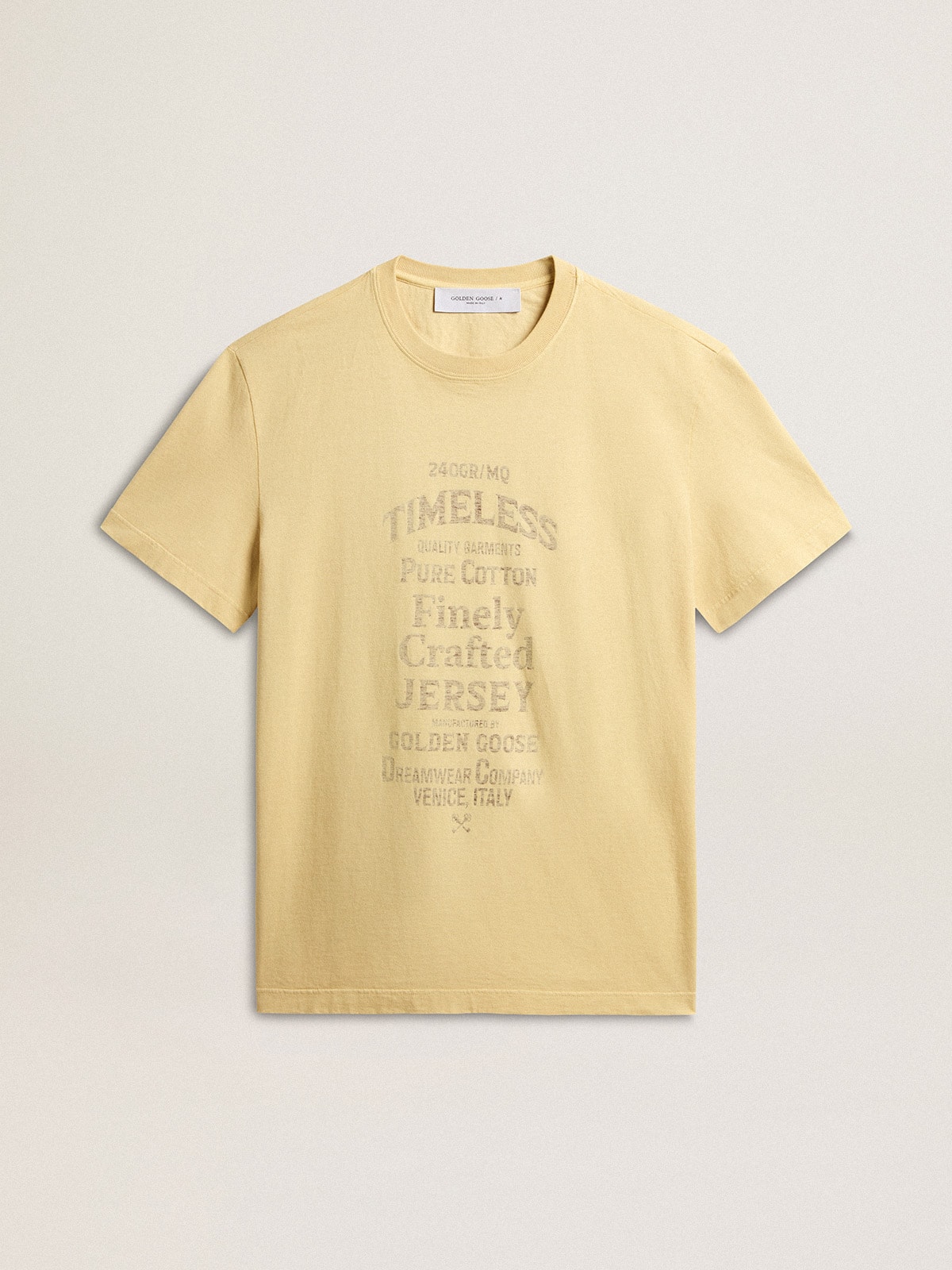 Golden Goose - T-shirt da uomo in cotone color giallo pallido e scritta sbiadita in 