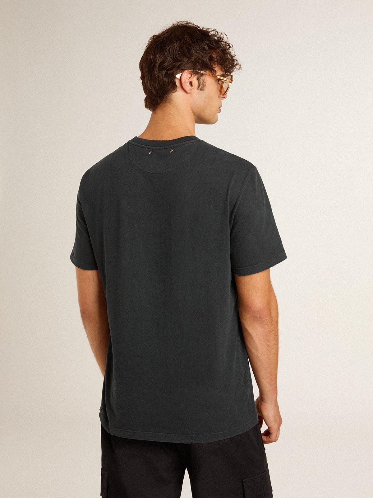 Golden Goose - Men’s worn-black cotton T-shirt with print on the front in 