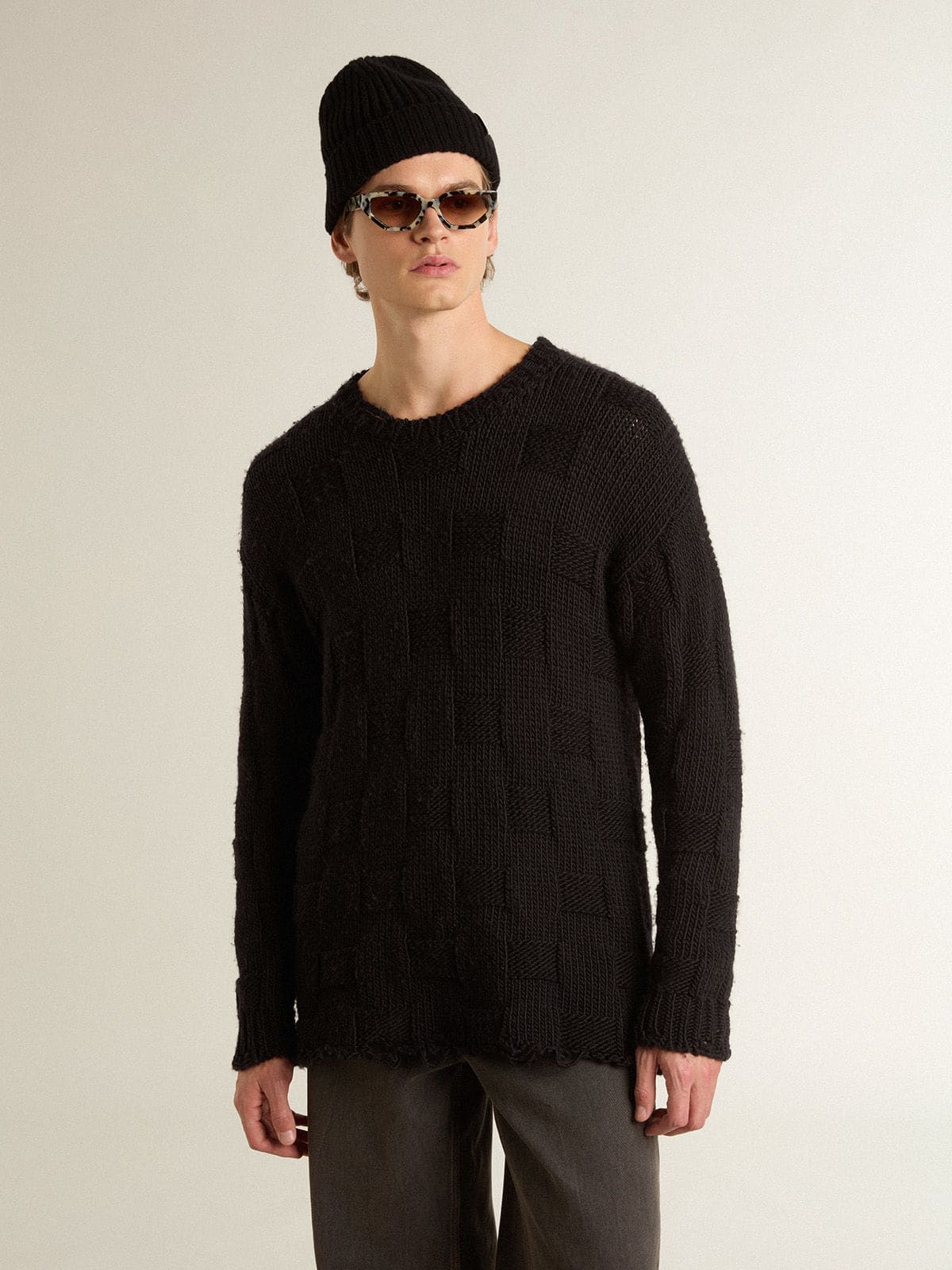 Jersey de lana negra de hombre con efecto desgastado