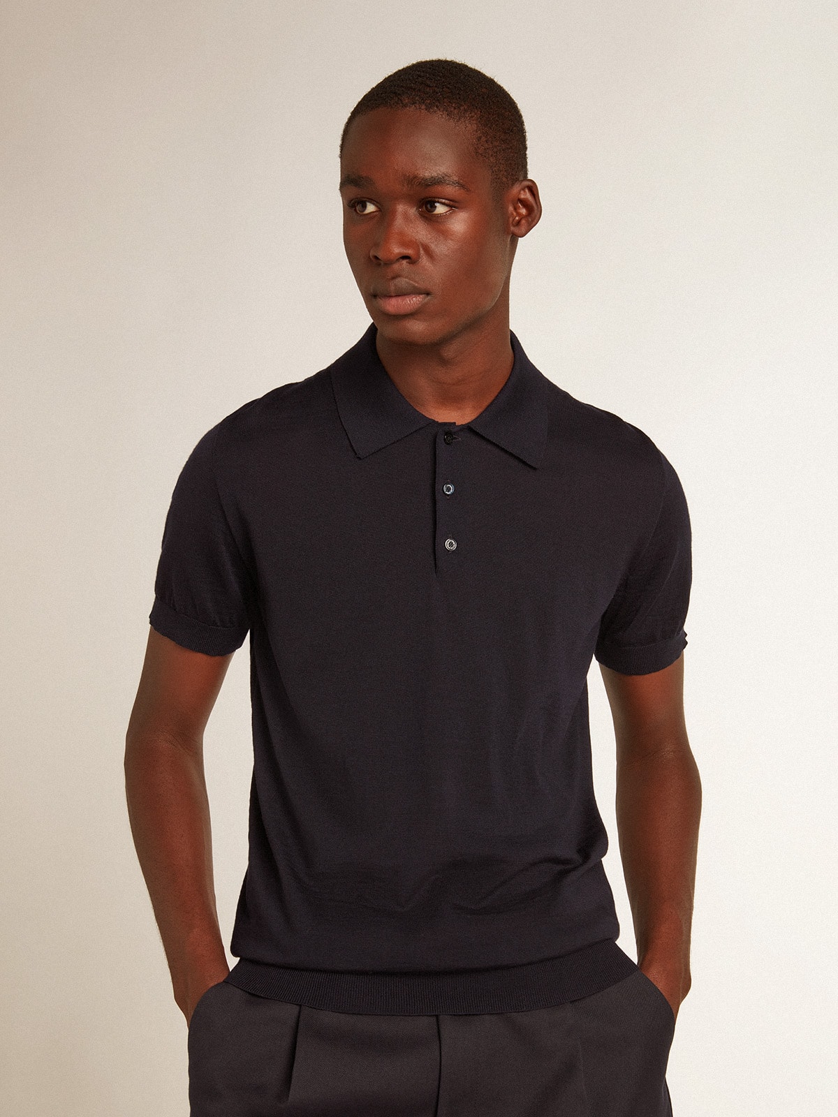 Men s short sleeved polo shirt in navy blue merino wool Golden Goose