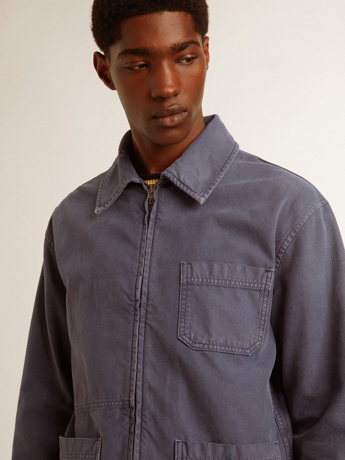 Men's blue jacket in denim cotton with distressed treatment | Golden Goose