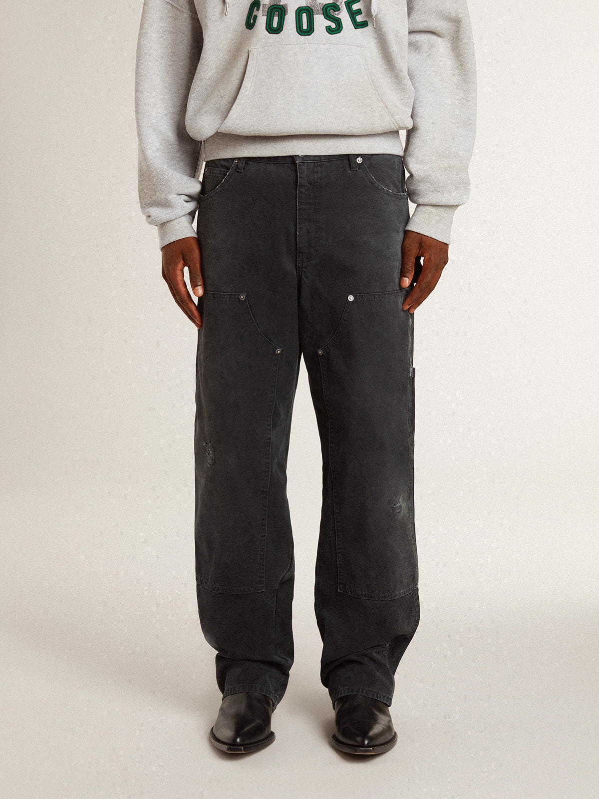 Golden Goose - Jeans da uomo in cotone di colore nero effetto distressed con patch frontali in 