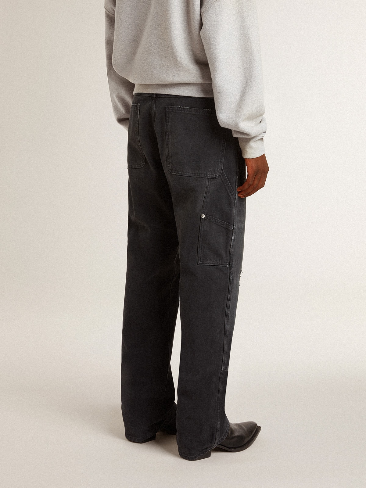 Golden Goose - Jeans da uomo in cotone di colore nero effetto distressed con patch frontali in 