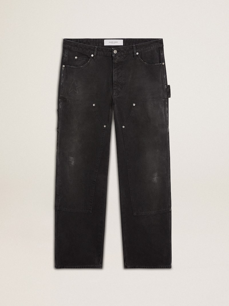 Schwarze Herrenjeans aus Baumwolle in Distressed-Optik mit Front-Patches