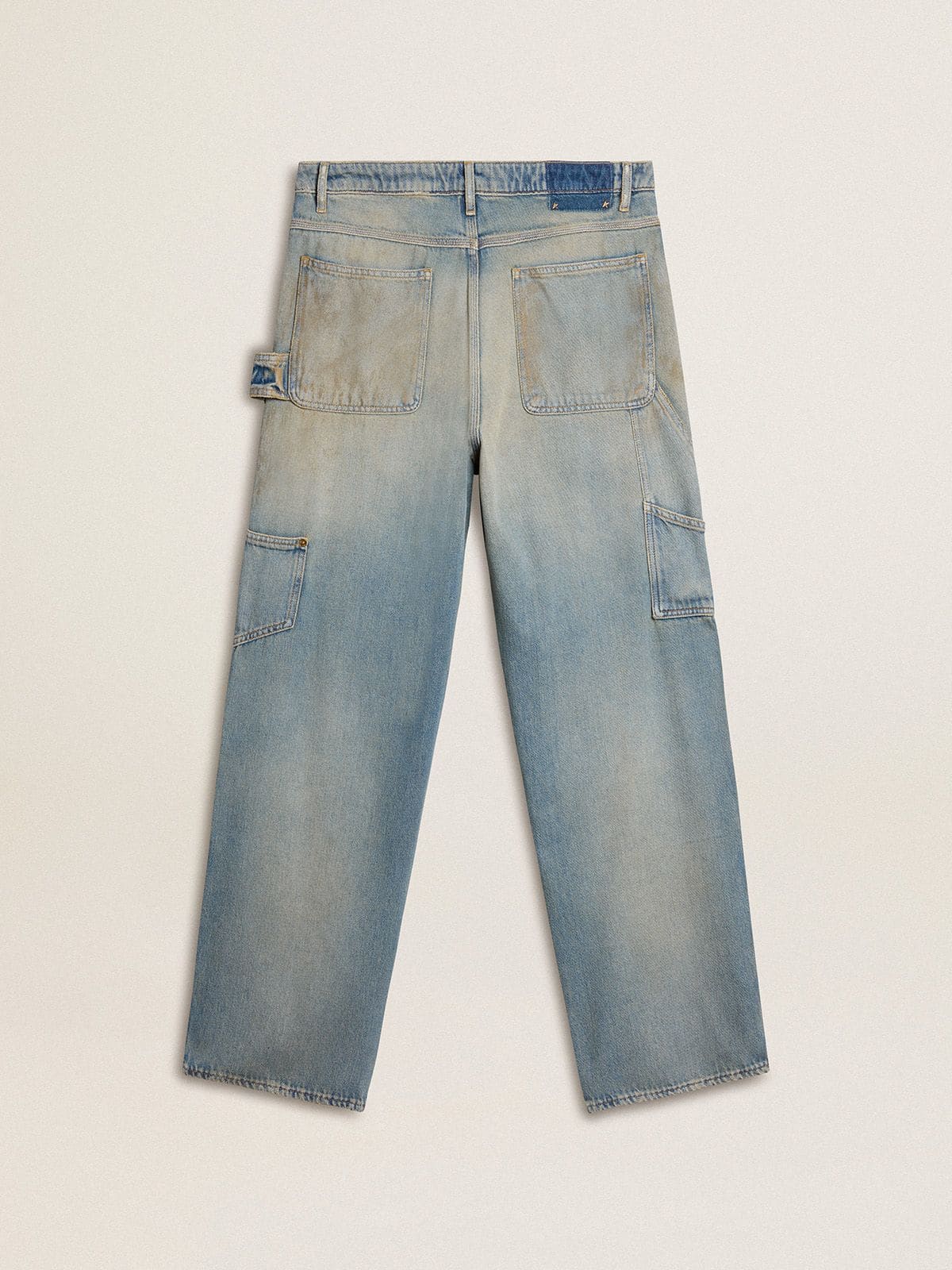 Golden Goose - Jeans da uomo con lavaggio sabbia dall'effetto distressed in 