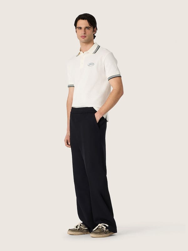 Polo da uomo in cotone bianco con motivo jacquard traforato