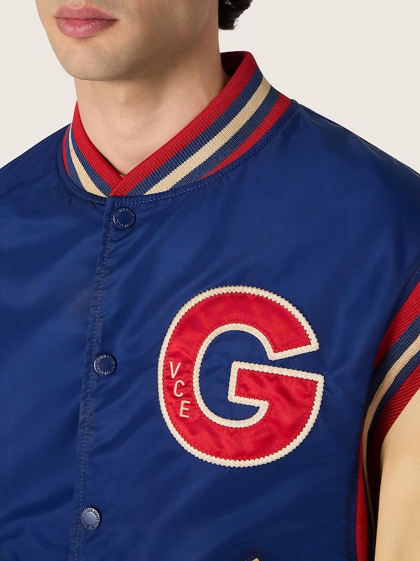 Golden Goose - Men's blue varsity bomber jacket with beige leather sleeves in 