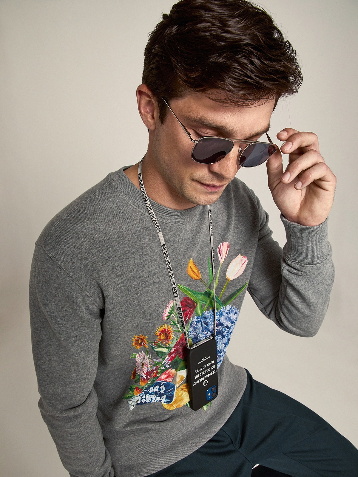 Golden Goose - Black Case for iPhone 12 and 12 Pro with contrasting white lettering in 