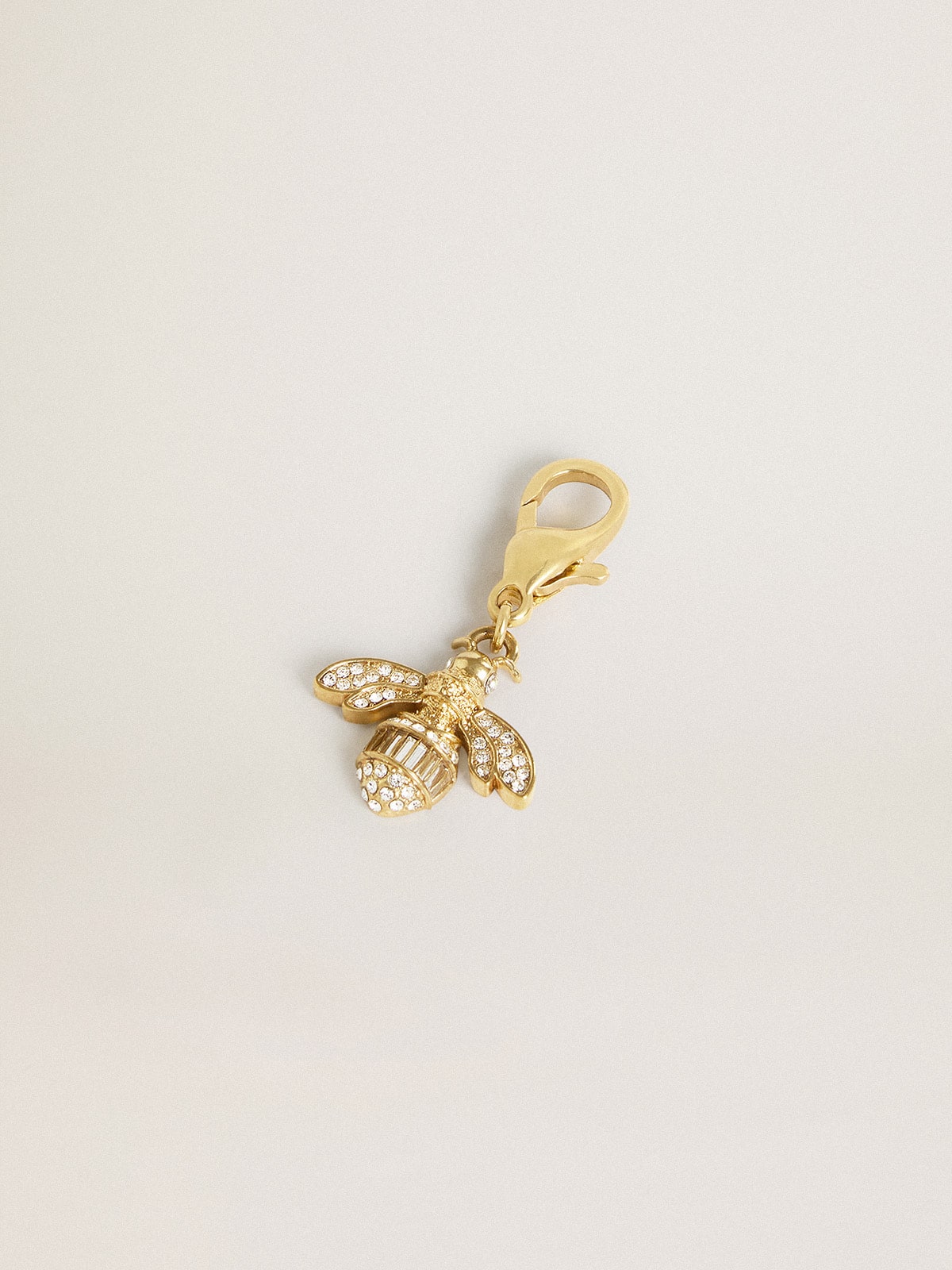 Golden Goose - Bee-shaped charm in gold-colored brass with crystals in 