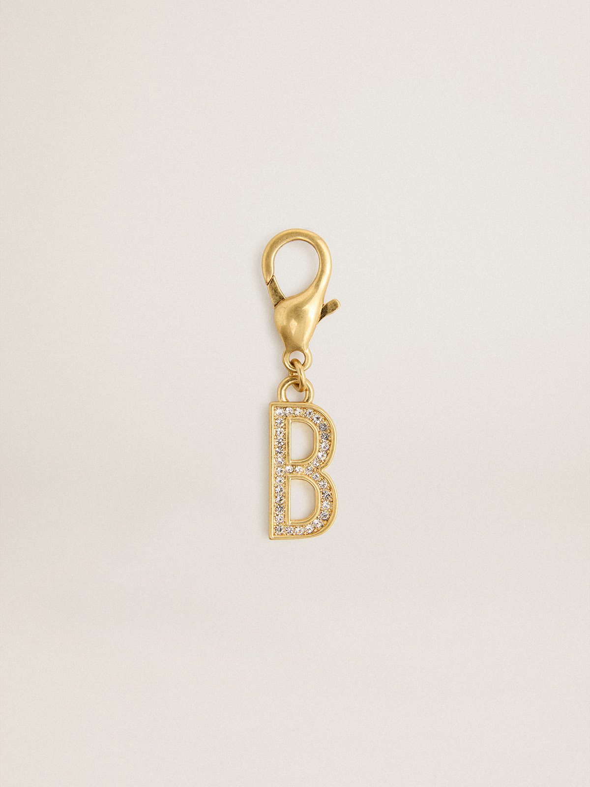 Letter B charm in gold-colored brass with crystals