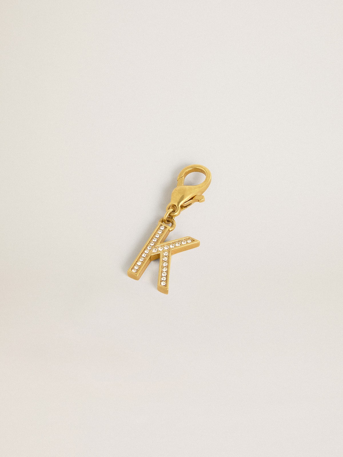 Golden Goose - Letter K charm in gold-colored brass with crystals in 