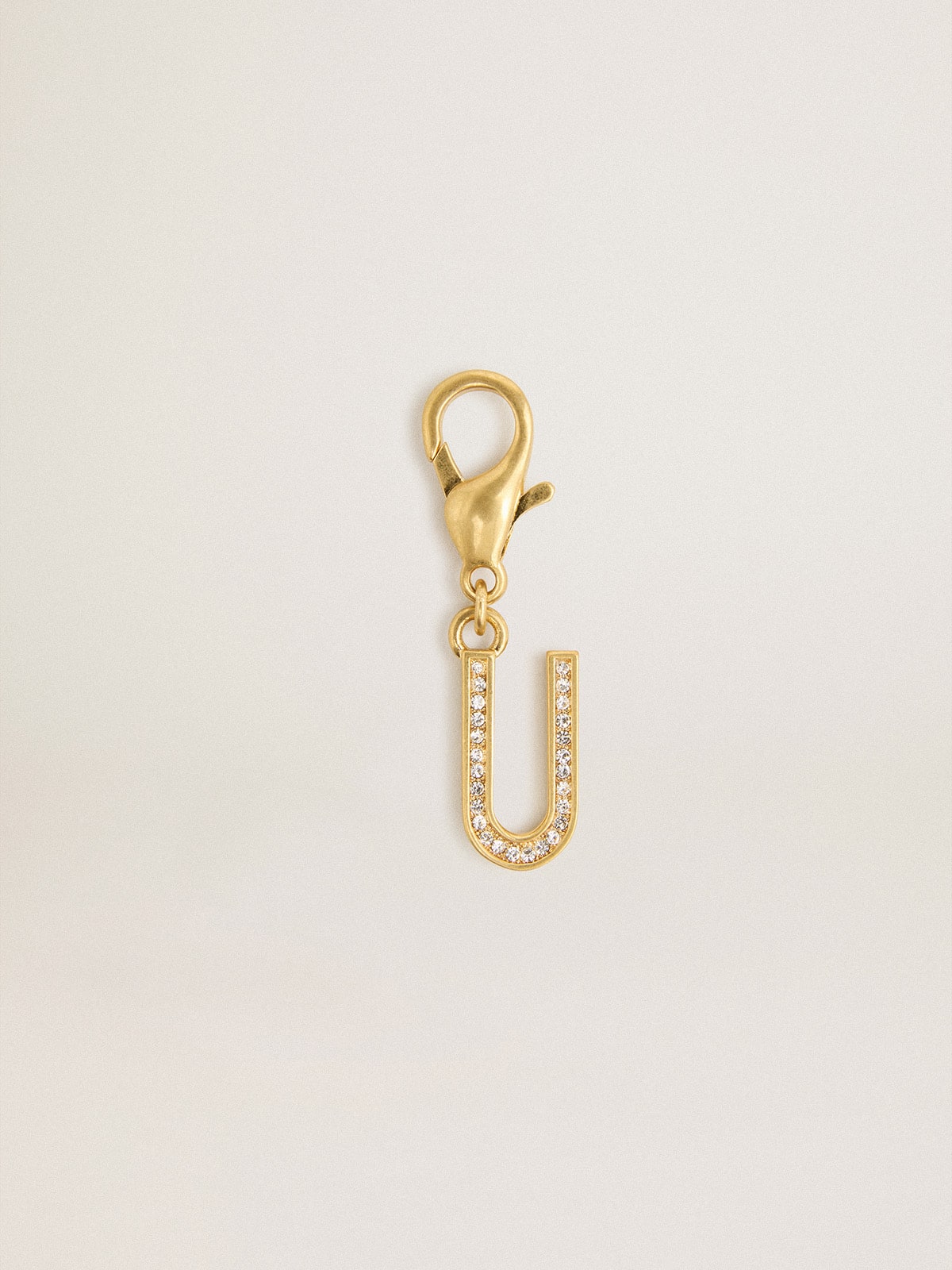 Golden Goose - Letter U charm in gold-colored brass with crystals in 