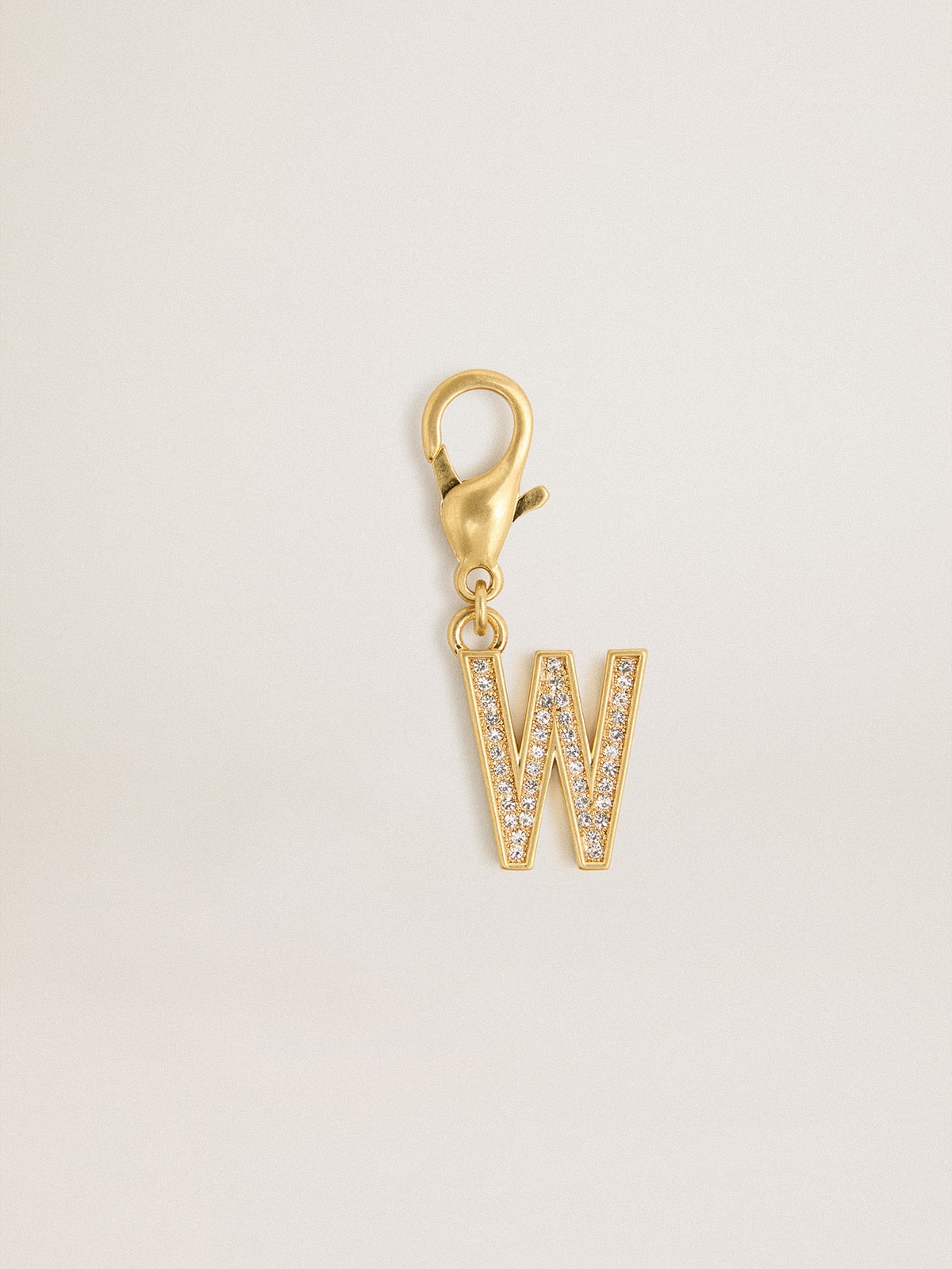 Golden Goose - Charm aus goldfarbenem Messing in Form des Buchstabens W mit Glassteinchen in 