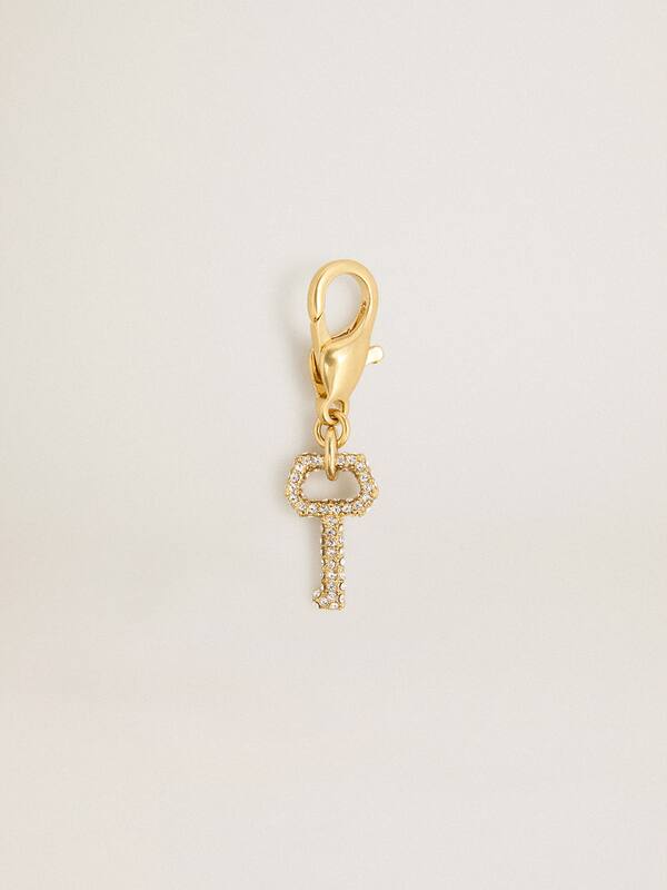 Golden Goose - Key-shaped charm in gold-colored brass with crystals in 