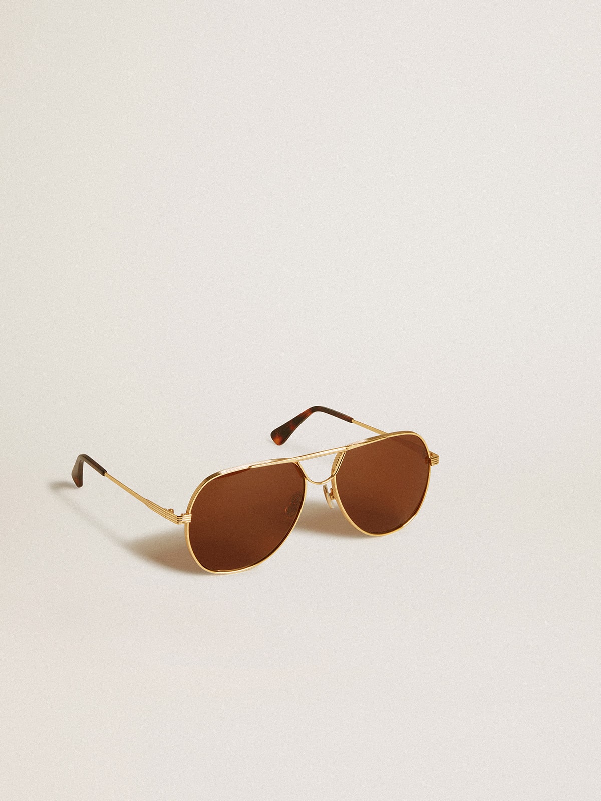 Golden Goose - Lunettes de soleil modèle aviateur avec monture dorée et verres marron in 