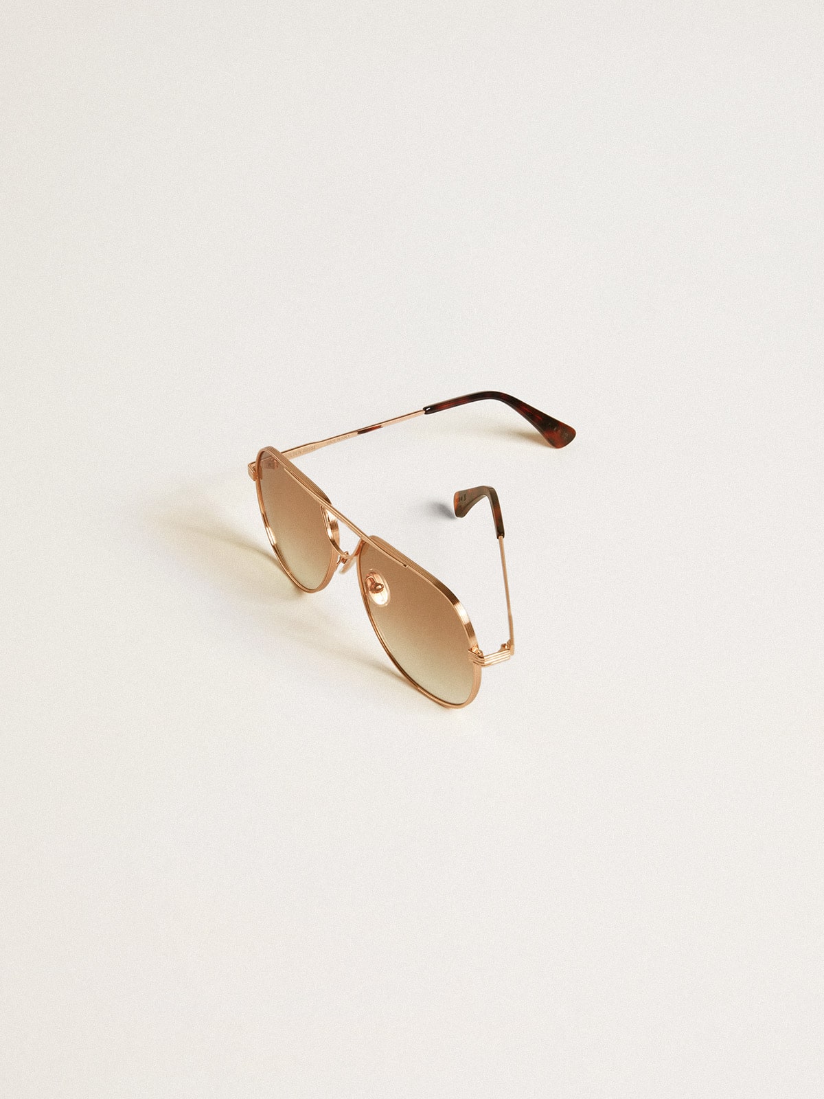 Golden Goose - Sonnenbrille mit roségoldfarbenem Pilotengestell und honigfarbenen Gläsern in 