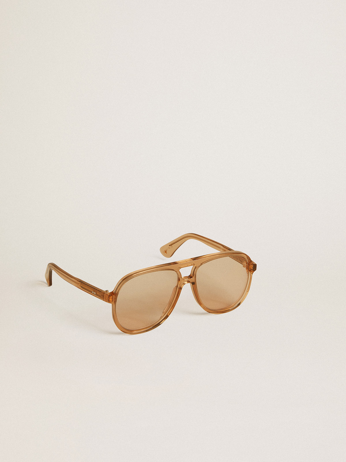 Aviator style sunglasses with honey-colored frame and lenses | Golden Goose