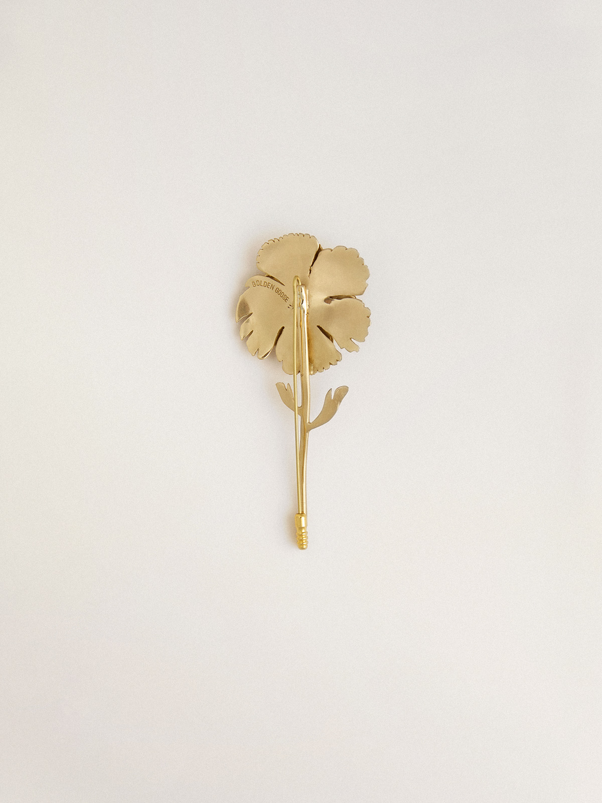 Golden Goose - Gold pin with floral design in