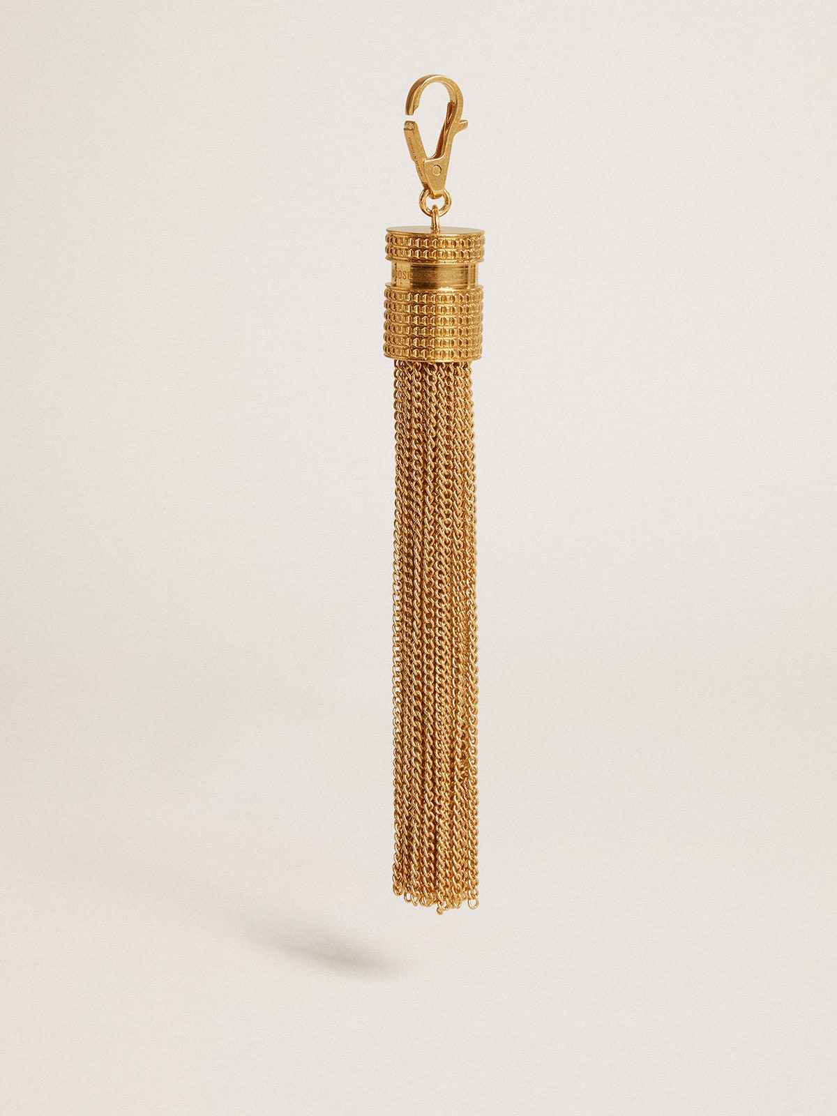 Golden Goose - Tassel-shaped charm in antique gold-colored brass in 