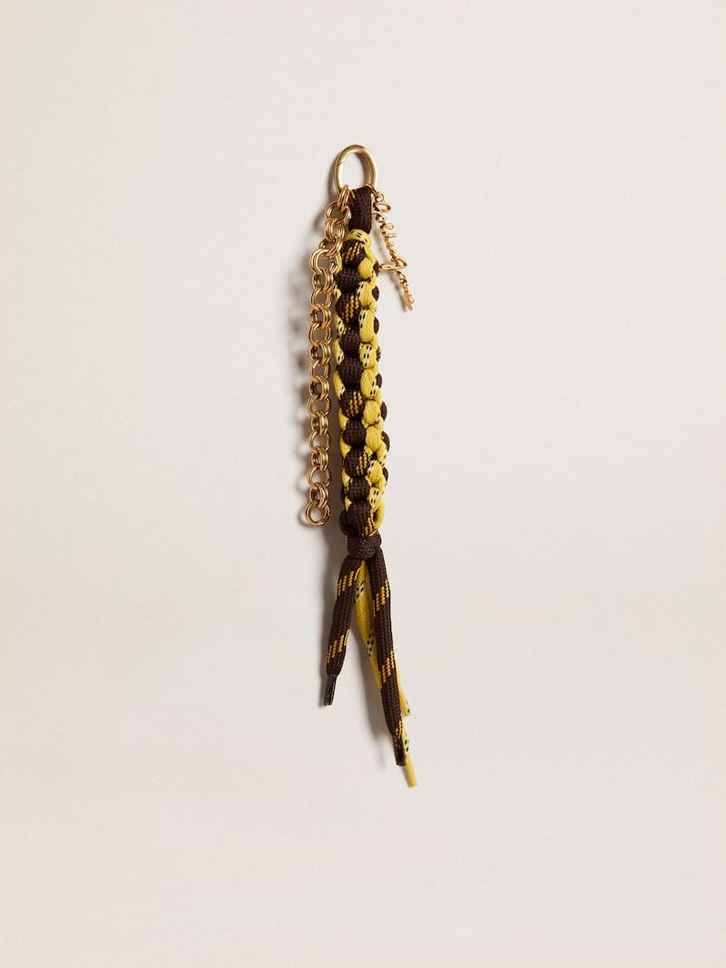 Charm with yellow and brown knotted hiking laces with chain 