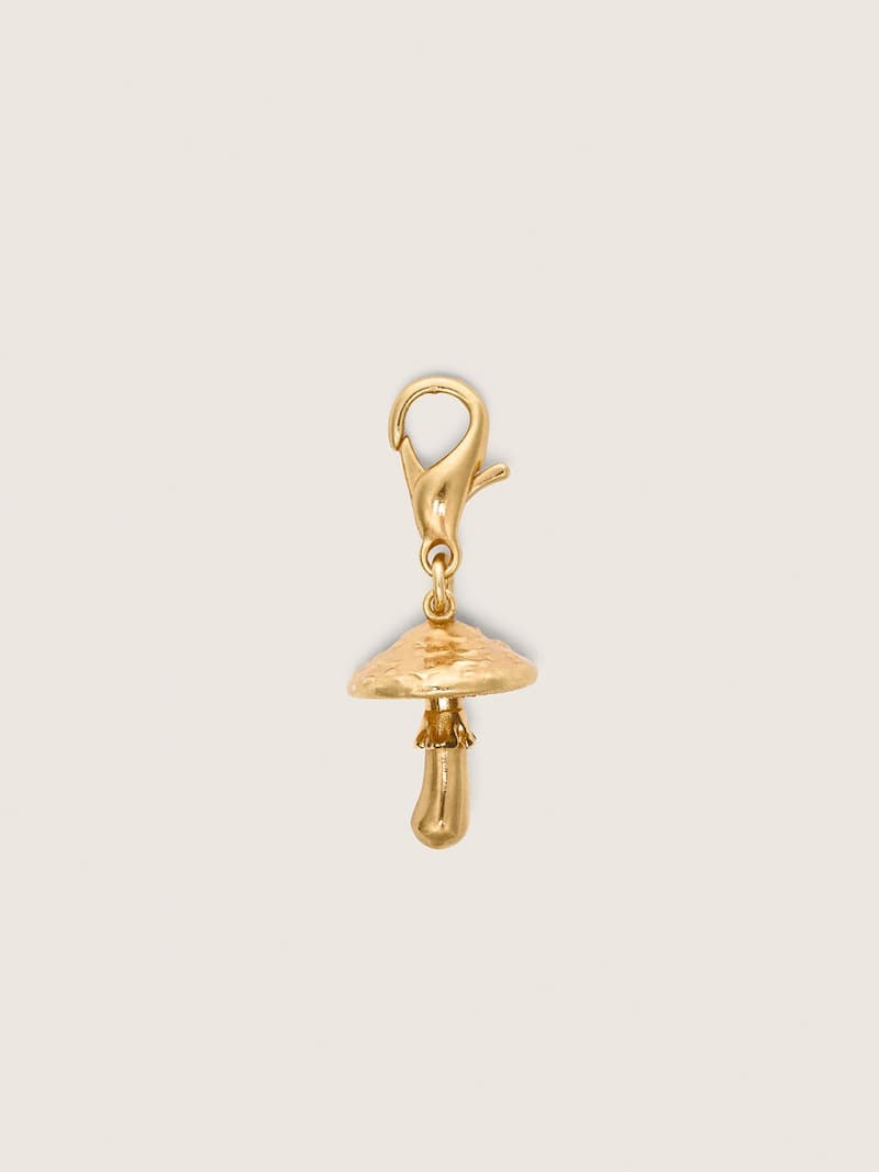 Mushroom charm in gold-colored brass