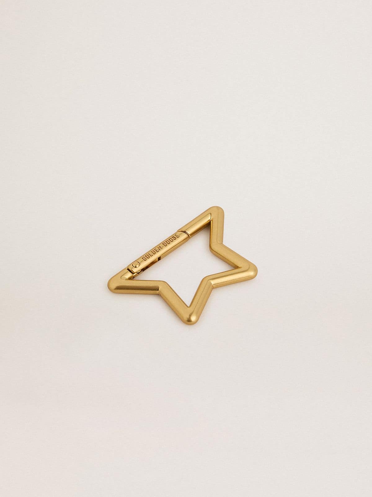 Golden Goose - Gold snap hook in the shape of the Golden star  in 