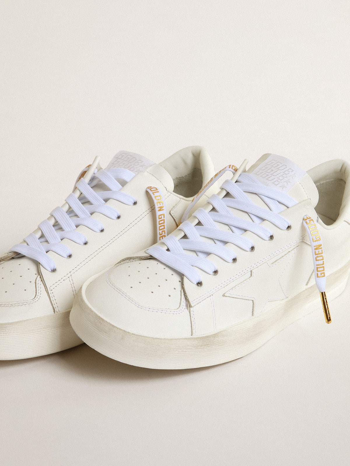 Golden Goose - Lacci in cotone bianco con logo color oro a contrasto in 