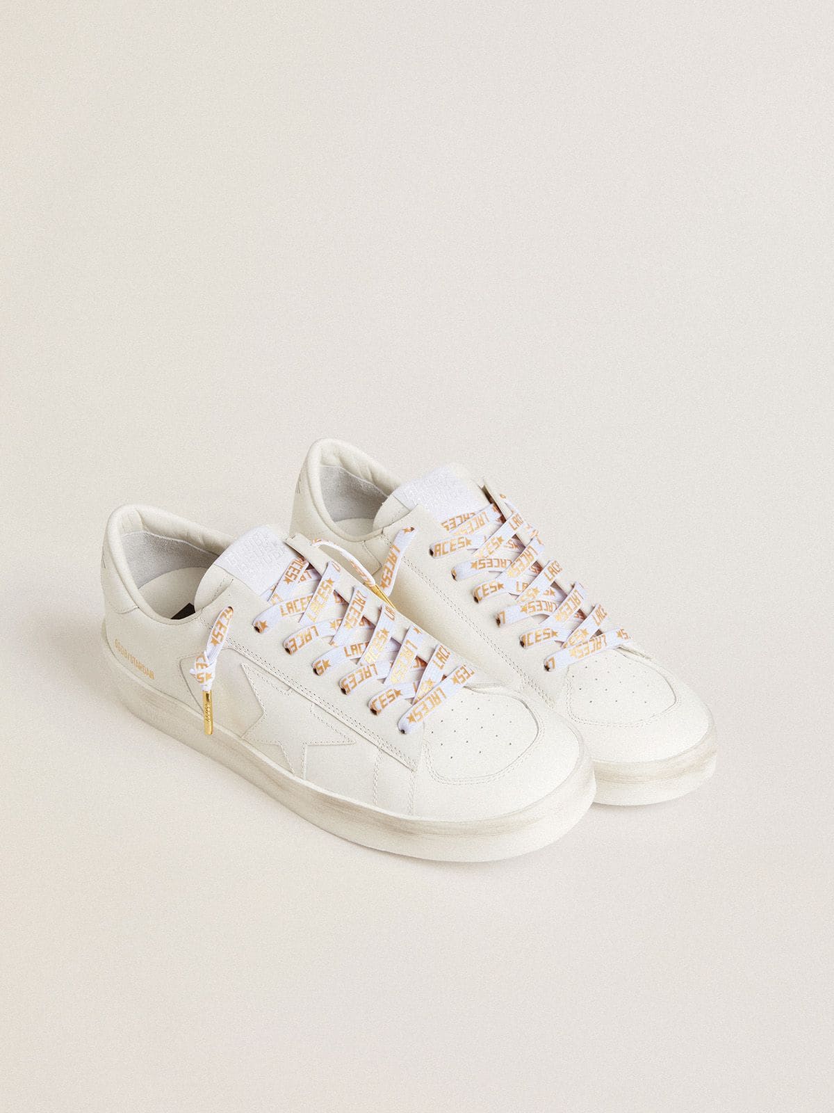 Golden Goose - White laces with contrasting gold-colored ‘Laces’ lettering in 