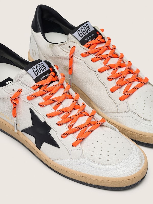 Orange hiking laces with gray and black details