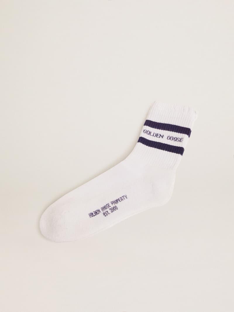 Chaussettes en coton à l’effet usé, rayures bleues et logo