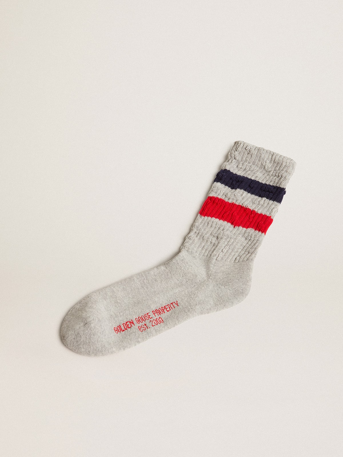 Golden Goose - Chaussettes grises avec rayures rouges et bleues et logo rouge en contraste in 