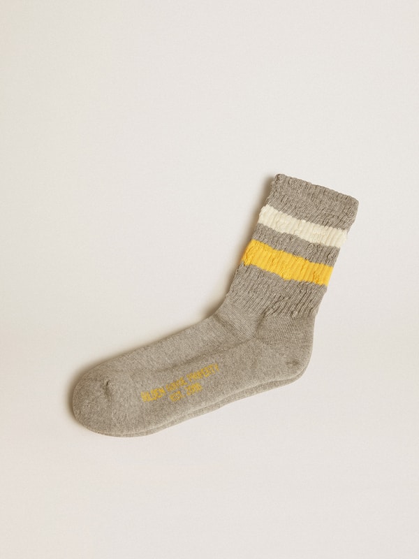Golden Goose - Gray socks with distressed details and yellow and white stripes in 