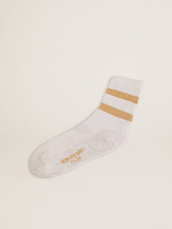 White socks in lurex with contrasting gold stripes and logo